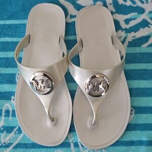 Michael Kors Silver Sandals with Metallic Medallion